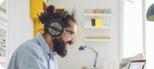 Engineer on a video call while working at a laptop